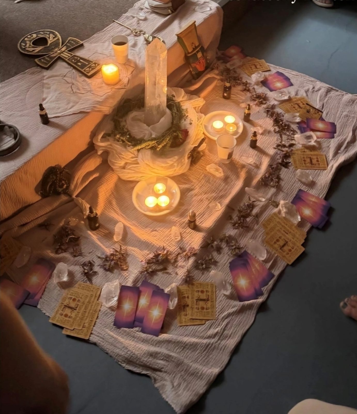 A ceremonial altar prepared with candles, crystals, and offerings before a Blue Lotus ceremony.